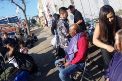 Tammy and the team cutting the homeless hair on the streets of San Diego downtown