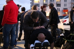 Dr. Eric gives a professional chiropractic adjustment to a homeless man on Easter.