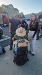 Noah and Peyton, Streets of Hope San Diego volunteers, give Francisco new wheelchair parts